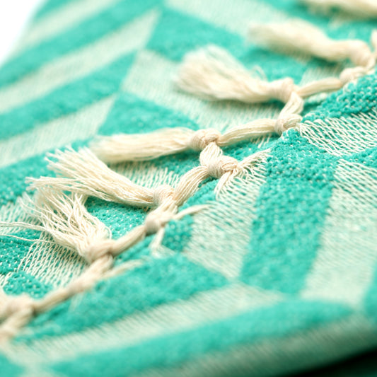 Le Pouf Luxe Throw Blanket – Ivory & Teal Green